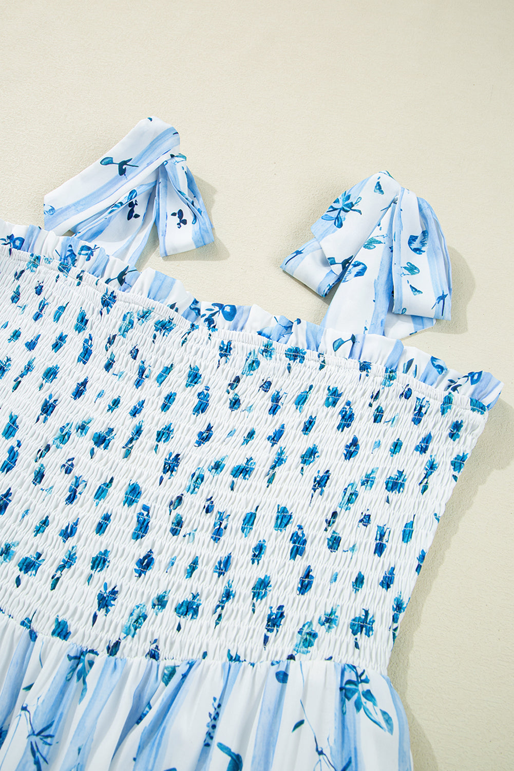 Sky Blue Floral Smocked Tied Straps A-Lined Maxi Dress. GCollection
