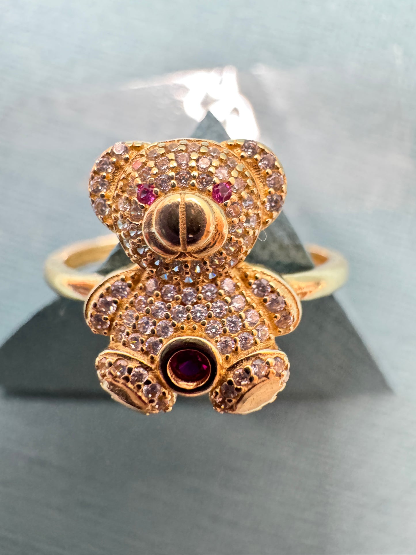 14K yellow gold teddy bear with red heart stone