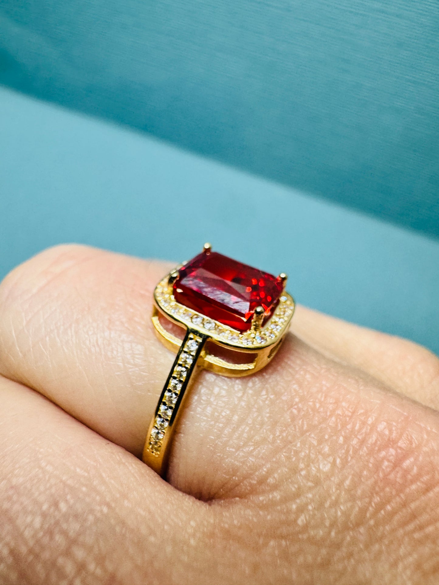 14K solid gold ring. Orange/red color stone.