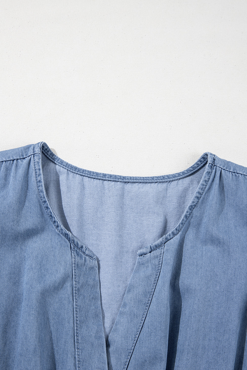 Blue Ruffled V Neck Smocked High Waist Denim Mini Dress. GCollection
