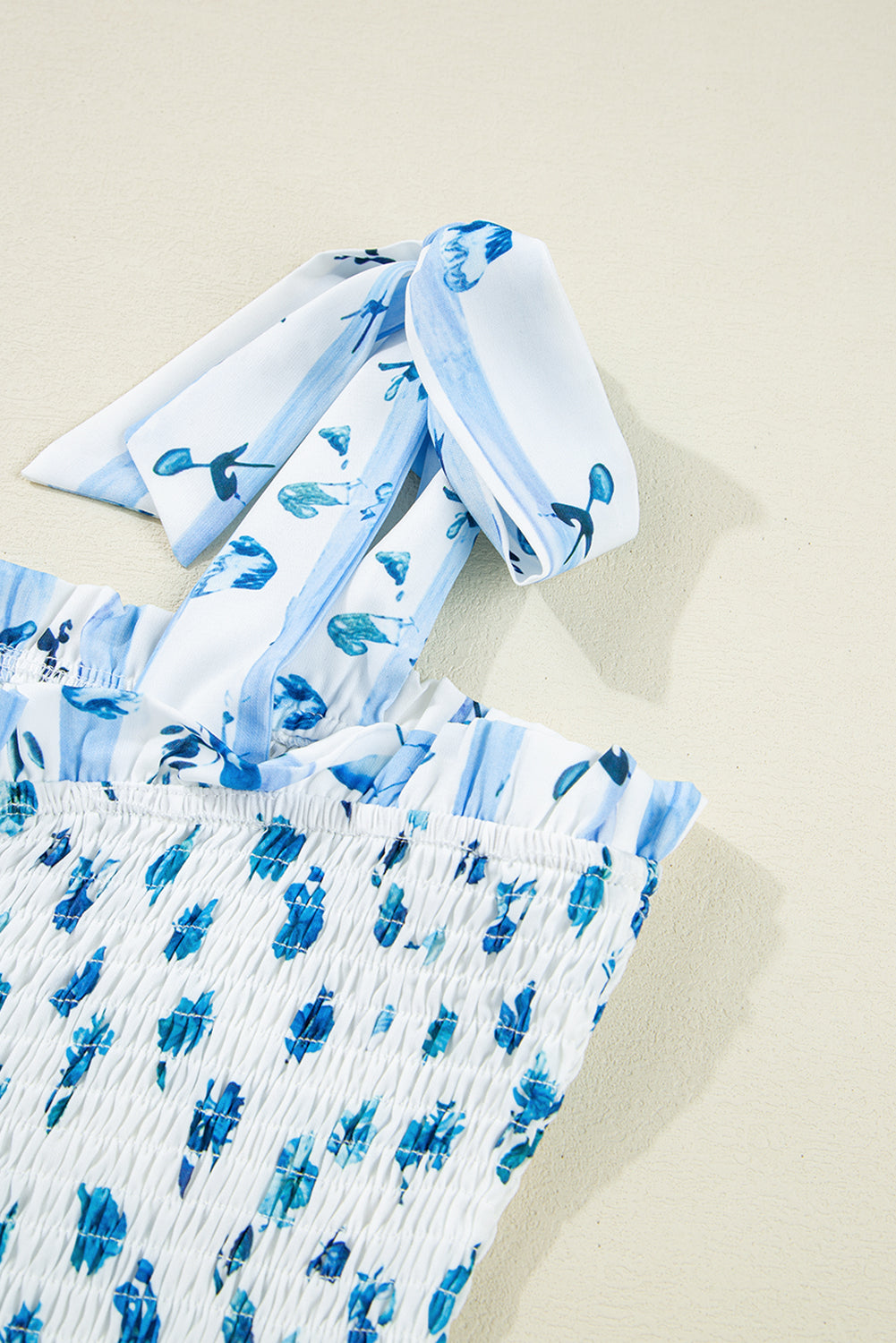 Sky Blue Floral Smocked Tied Straps A-Lined Maxi Dress. GCollection