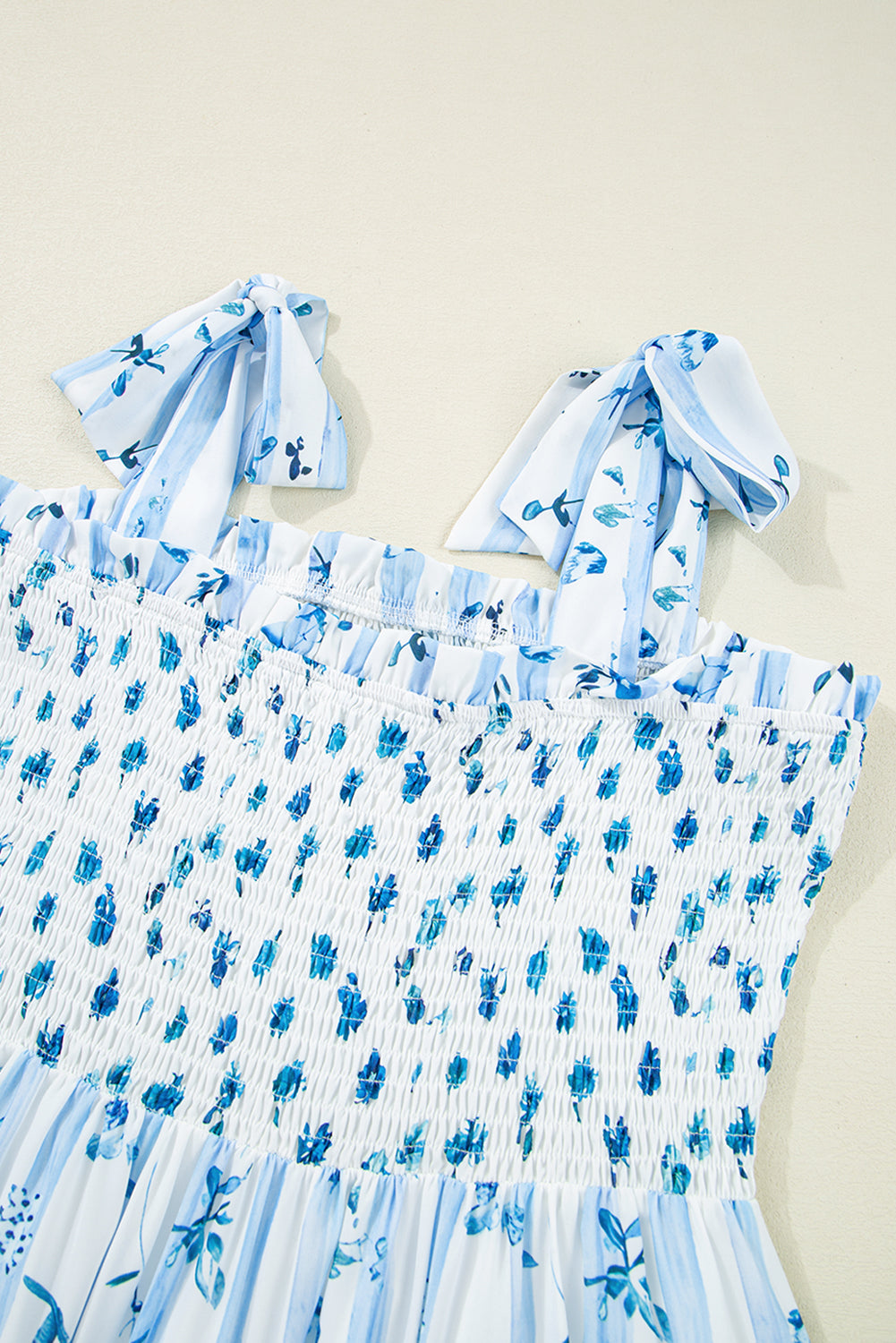 Sky Blue Floral Smocked Tied Straps A-Lined Maxi Dress. GCollection
