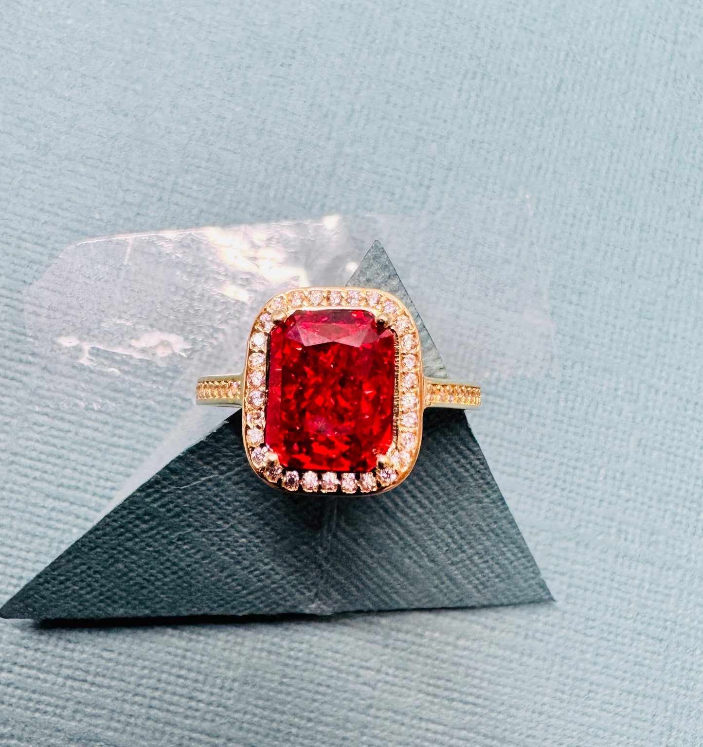 14K solid gold ring. Orange/red color stone.