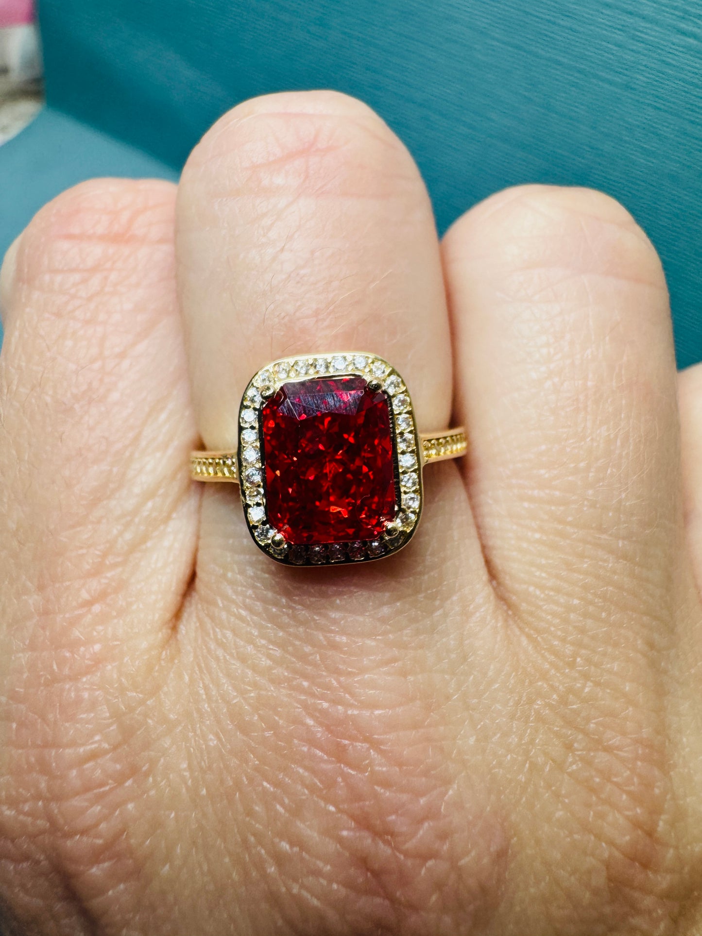 14K solid gold ring. Orange/red color stone.