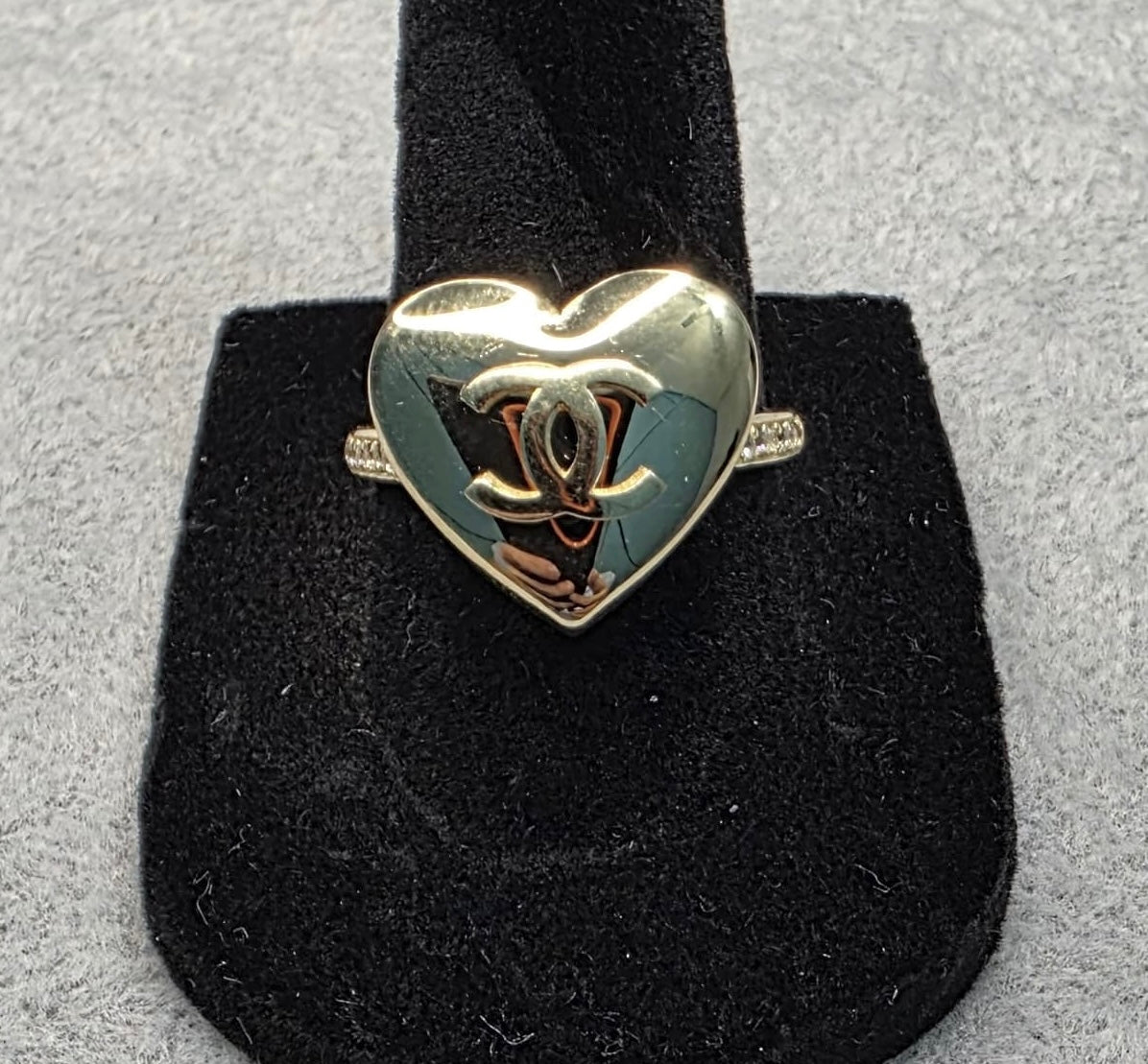 14K solid gold CC puffy heart ring with white stones.