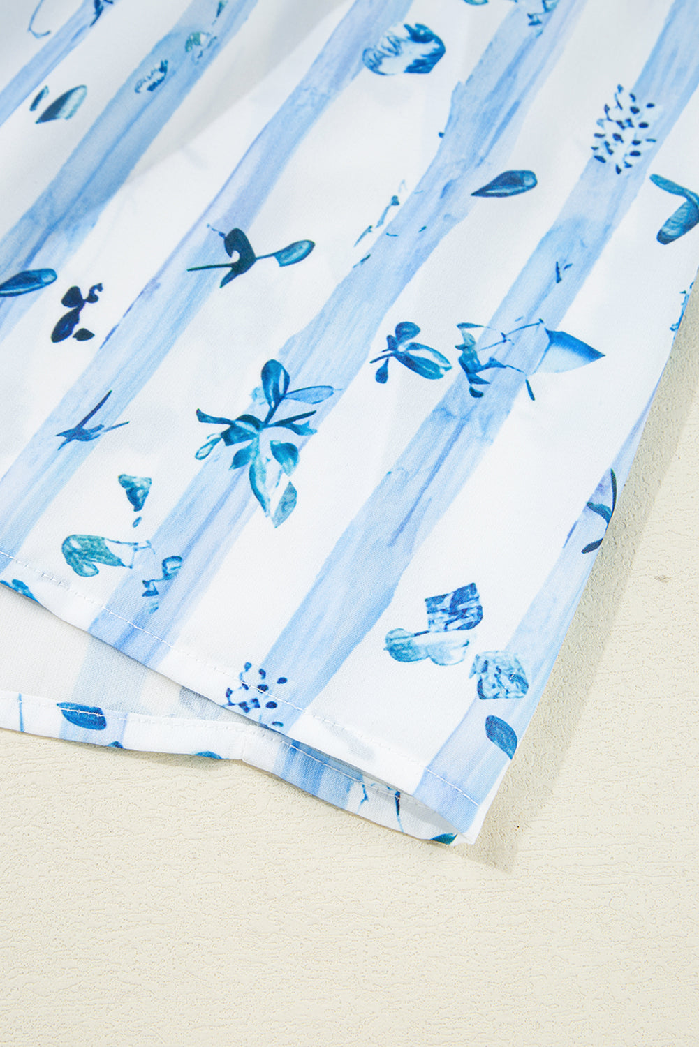 Sky Blue Floral Smocked Tied Straps A-Lined Maxi Dress. GCollection