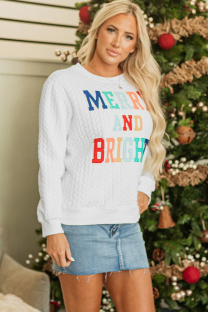 White “Merry and Bright” sweatshirt. GCollection