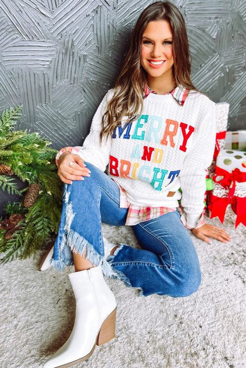 White “Merry and Bright” sweatshirt. GCollection