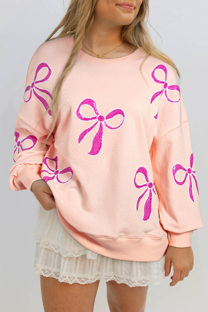 Apricot and sequined bows oversized sweatshirt. GCollection