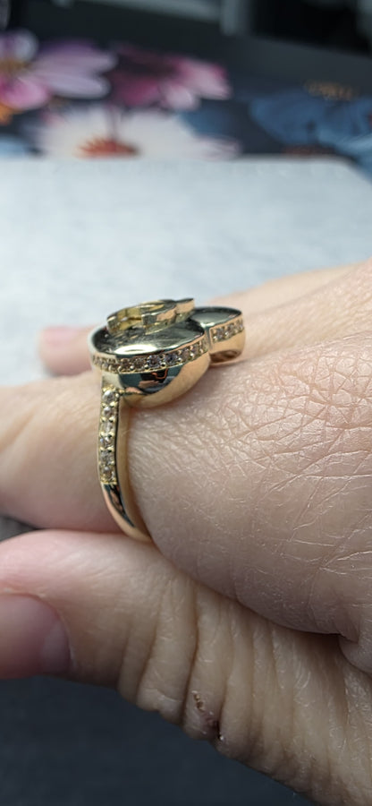 14K solid gold CC puffy heart ring with white stones.
