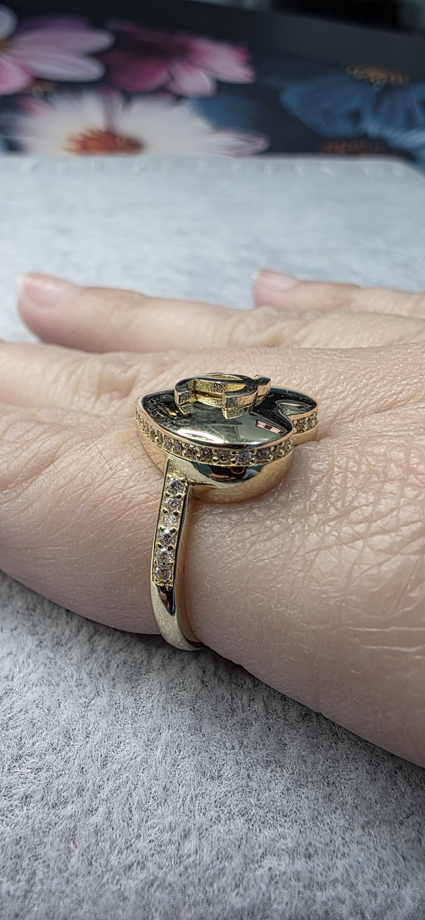 14K solid gold CC puffy heart ring with white stones.