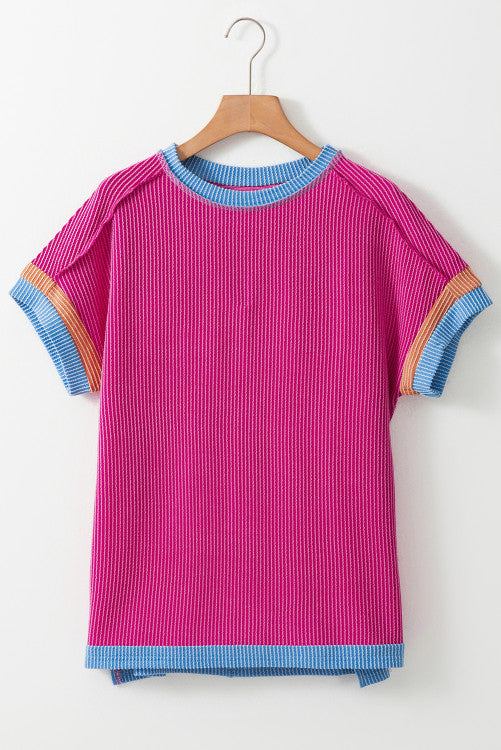 Pink textured top with multicolor trim. WS