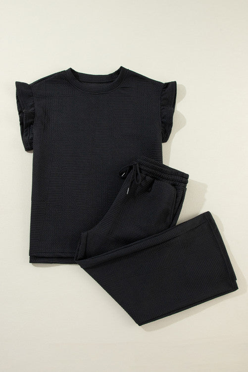 Black textured top and pants set with pockets. WS