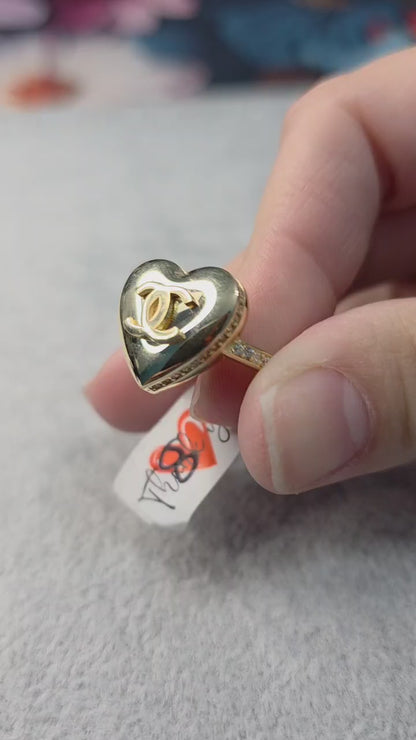 14K solid gold CC puffy heart ring with white stones.